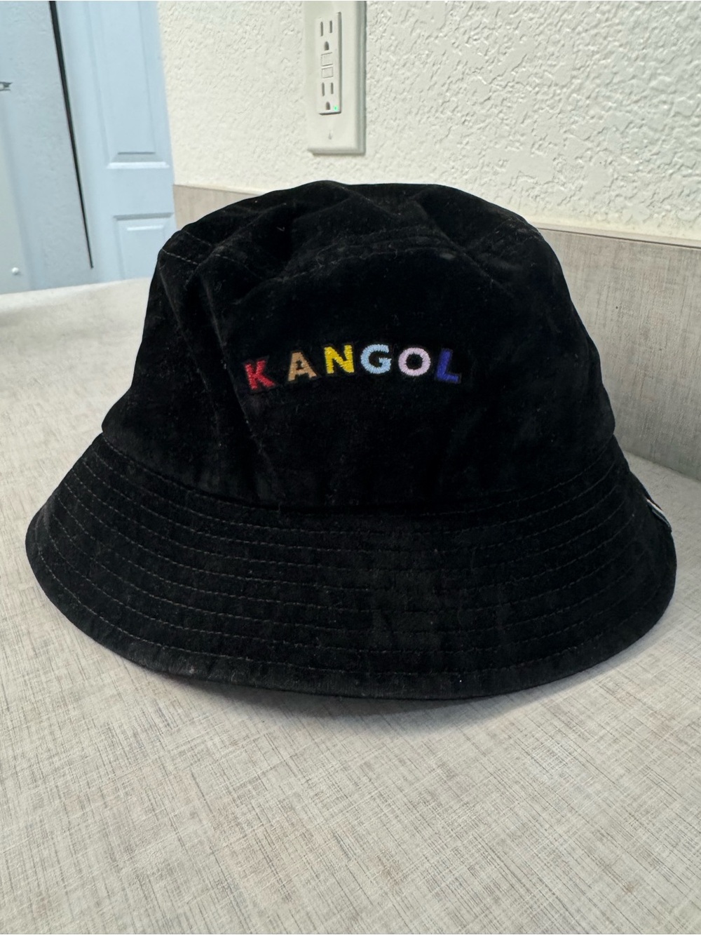 Kangol Black Bucket Hat with Rainbow Logo